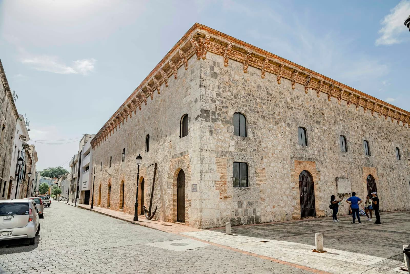 Colonial stone building on a cobblestone street